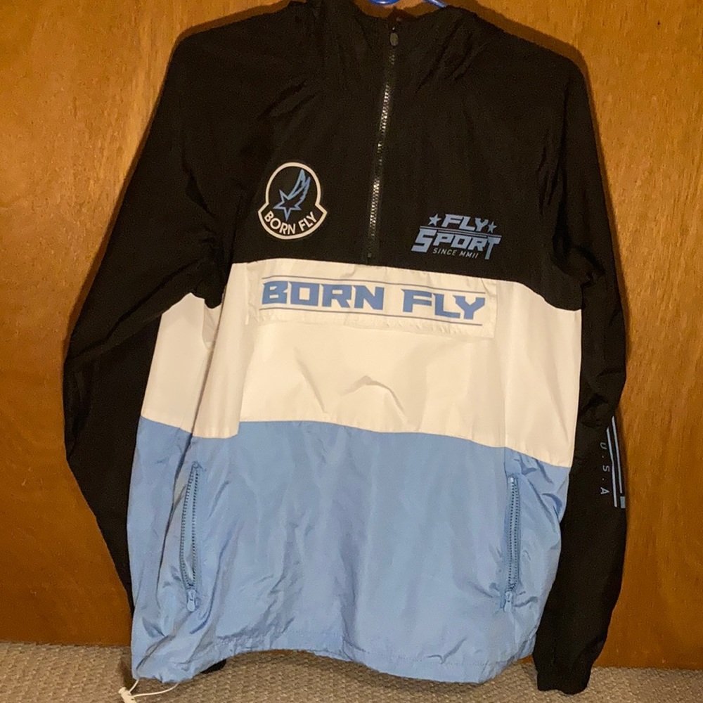 Born fly USA wind breaker, 3 tone light blue black and white. Size L